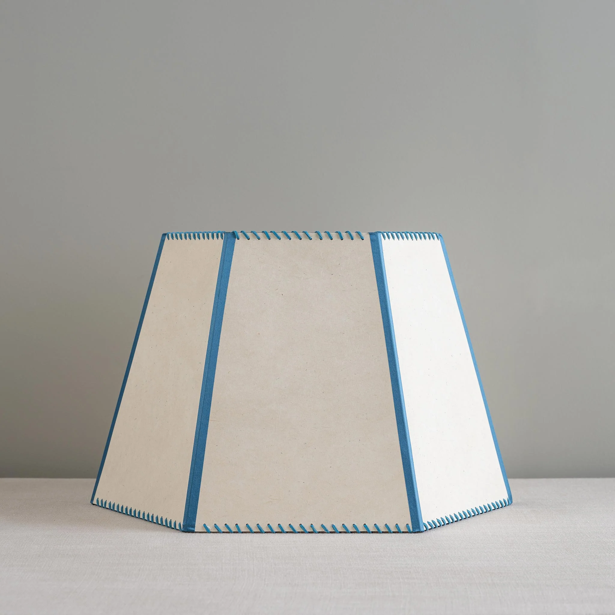 Townhouse Hexagonal Lamp Shade in Soft White with Peacock Blue Trim & Stitching - Image 3